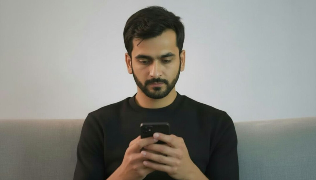 concerned person using smartphone