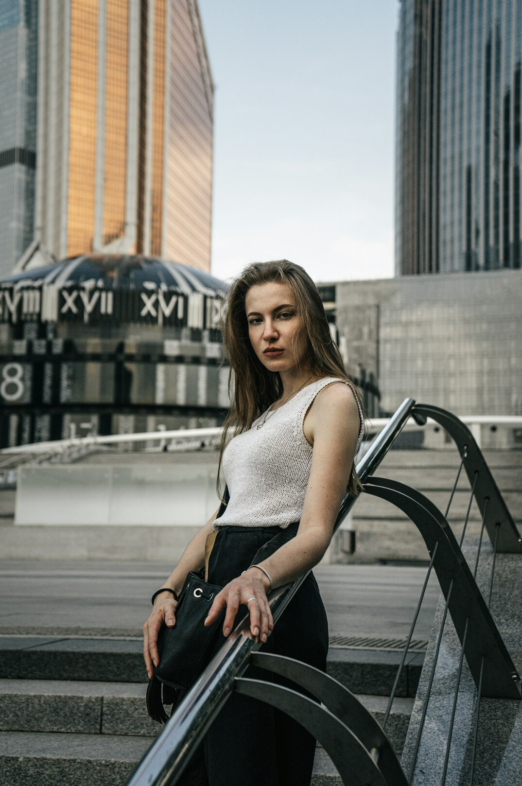 Professional portrait of a young woman with blonde hair in an office